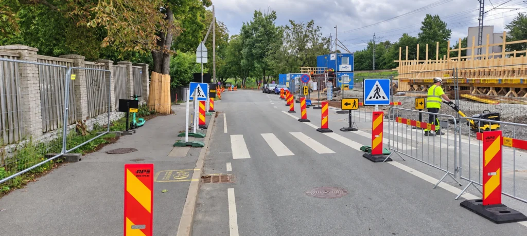 Temporary traffic signs and barriers at a roadworks site